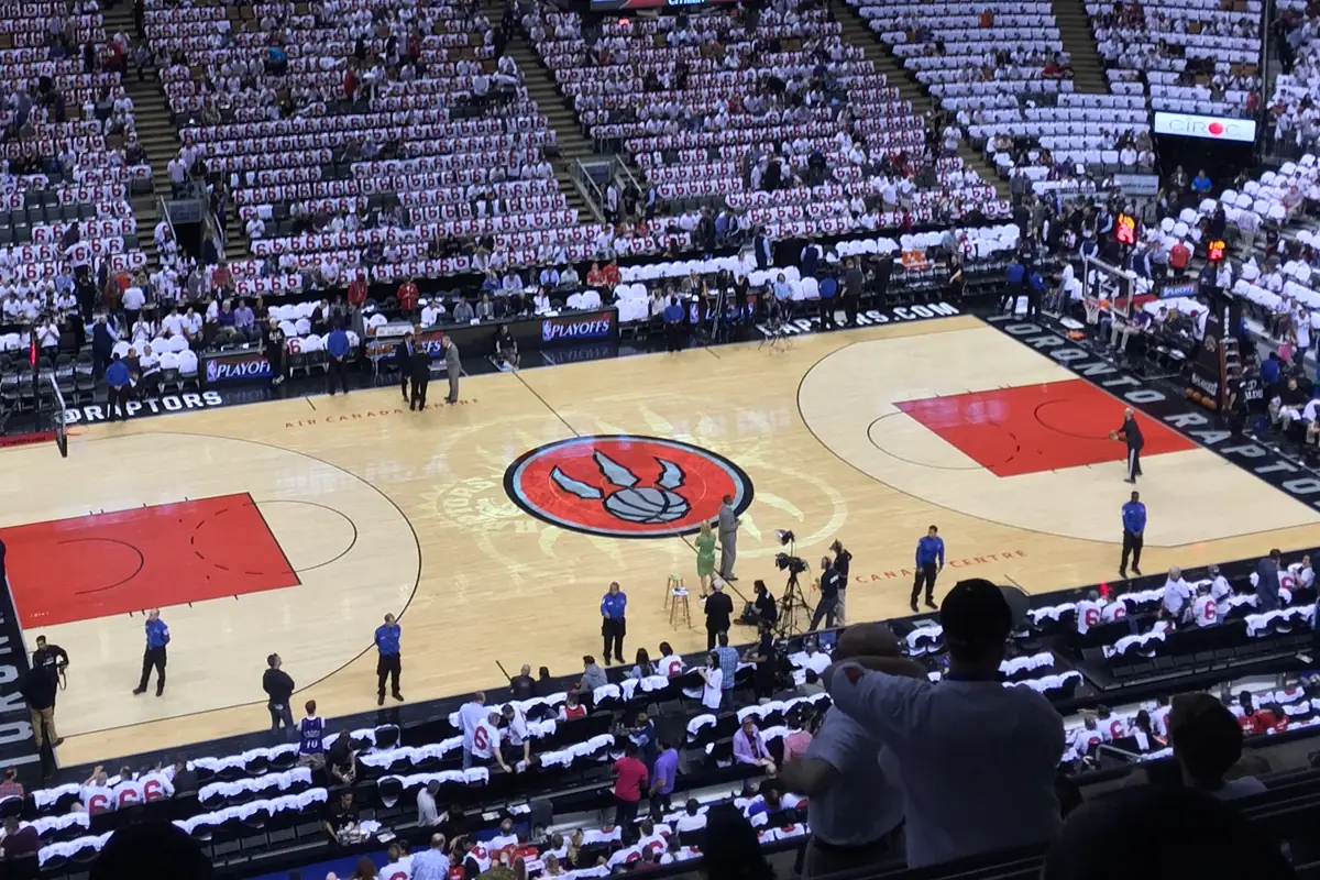 Toronto Raptors playoff game with the arena filled with white shirts