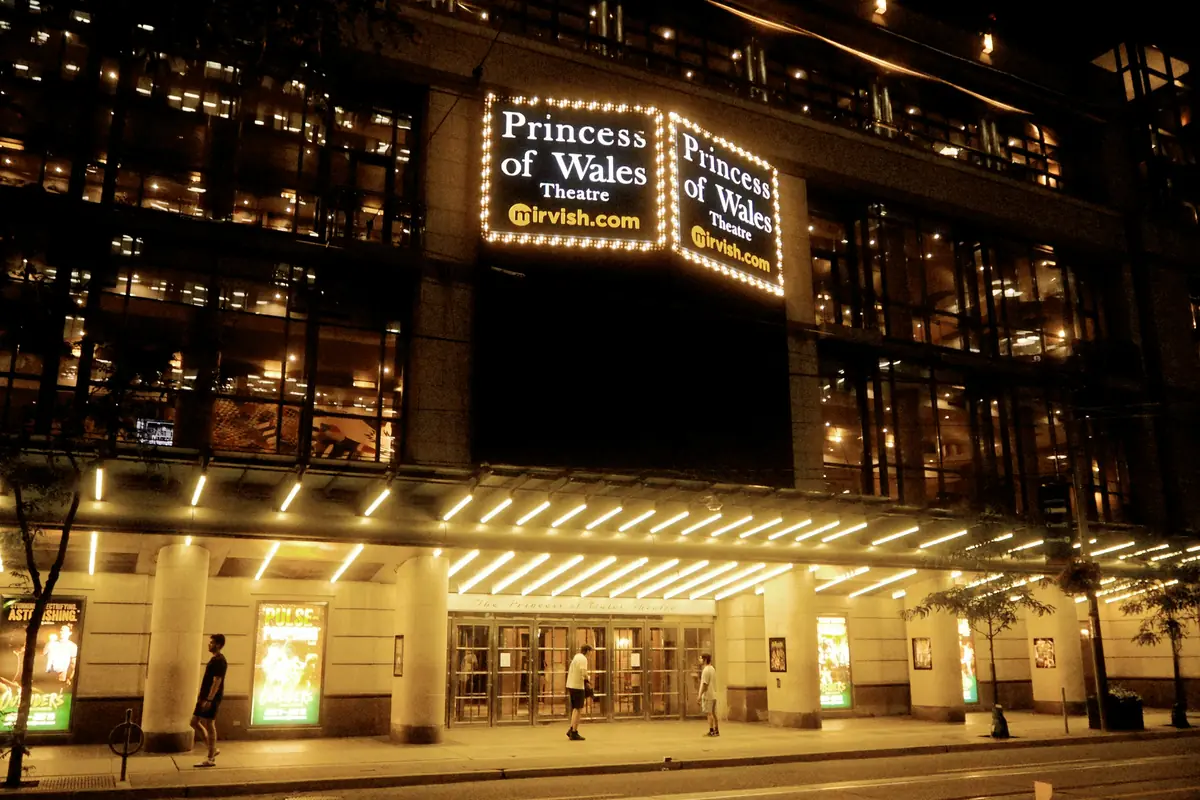Princess of Wales Theatre entrance lit up at night